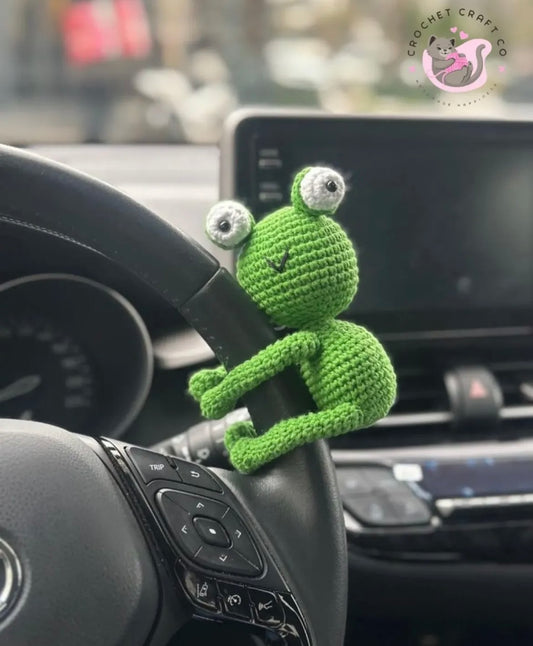 Steering wheel hugging frog